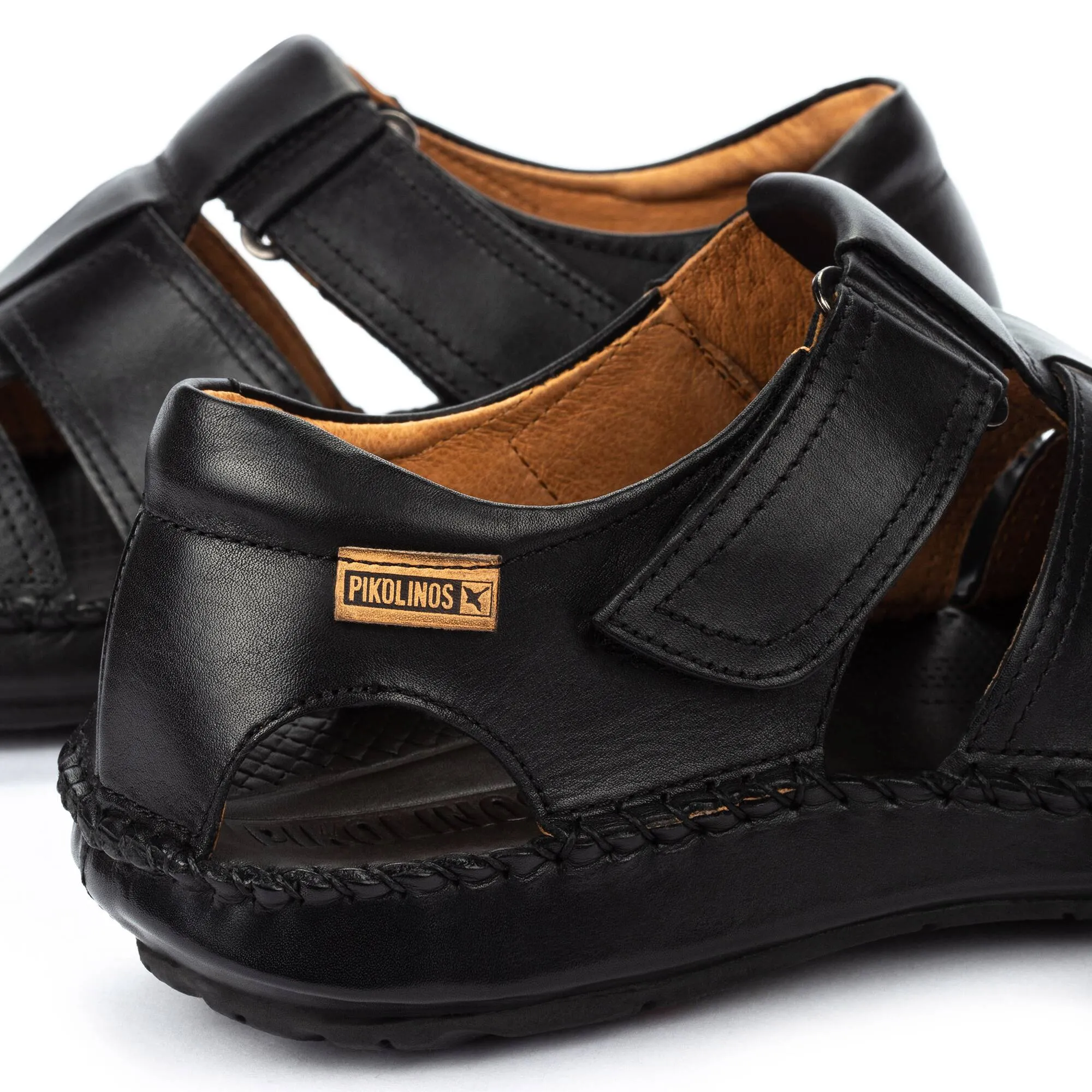 Certainly! Heres an optimized version of the product title with modifiers for an English-speaking e-commerce audience:

Elegant Black Tarifa Sandals by Pikolinos at Brandys Shoes